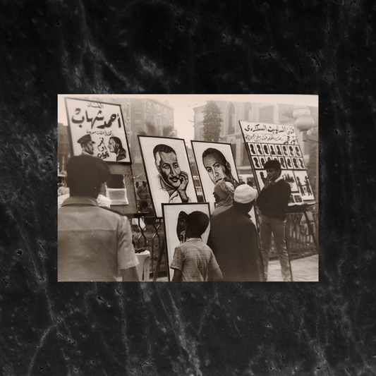 People viewing street portraits of Nasser and others in Cairo, 1960s \ Photo